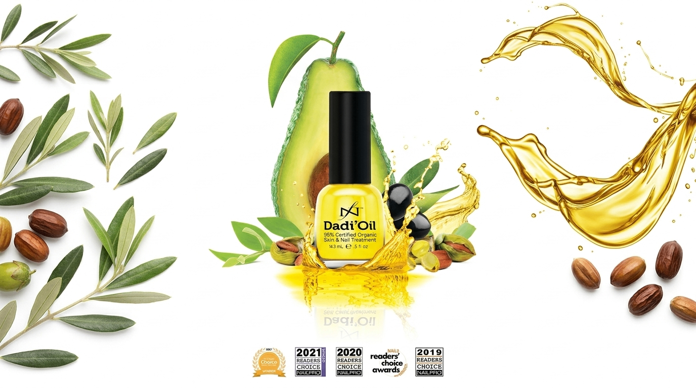 A bottle of Dadi’ Oil nail and cuticle treatment centered on a white background, surrounded by avocado, olive leaves, seeds, and golden oil splashes